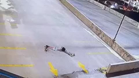 Guy falls off scooter hard