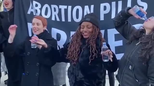 Deranged Abortion Activists Eat Abortion Pills Outside Supreme Court As Roe v. Wade Challenged