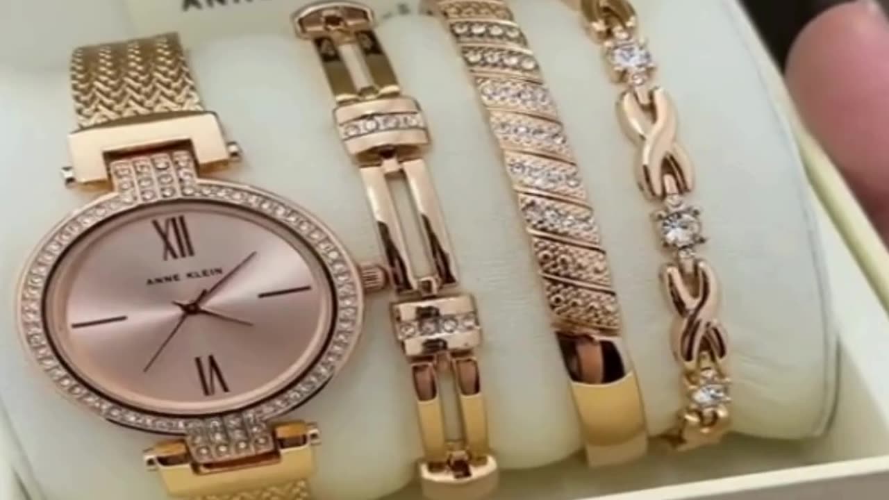 Anne Klein Women's Premium Crystal Accented Bangle Watch Set.link in box.