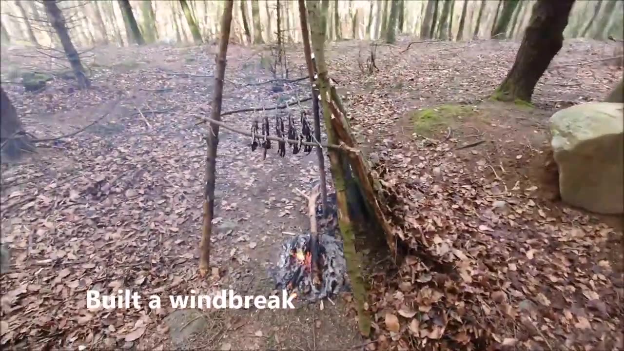 Making beef jerky over open fire