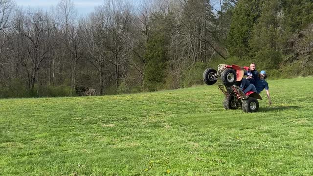 Playing football on a four wheeler