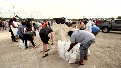 Floridians fill sandbags to prepare for Hurricane Helene