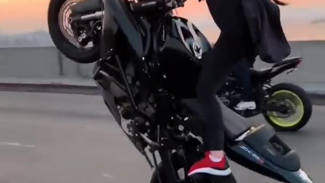 Biker girl stunt