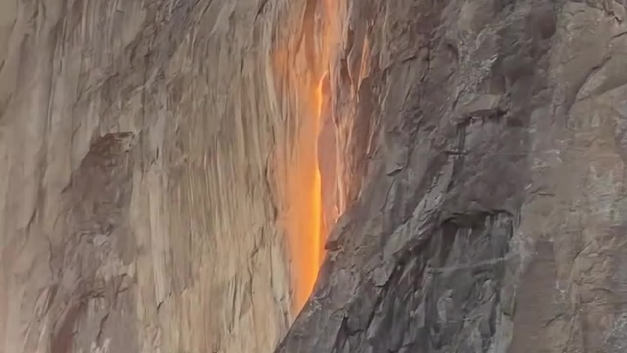 the sunset makes it look like a waterfall of fire