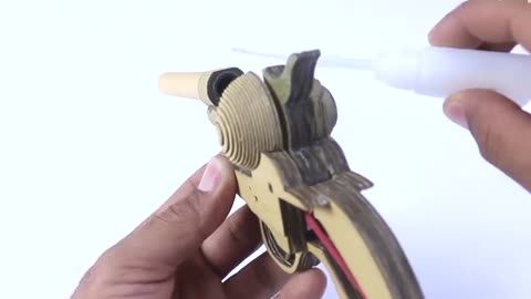 Demonstrate the paper process of a revolver