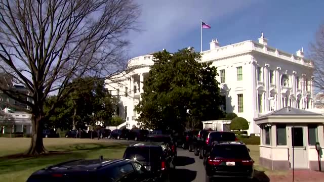 Crowd cheers as Biden leaves Georgetown church