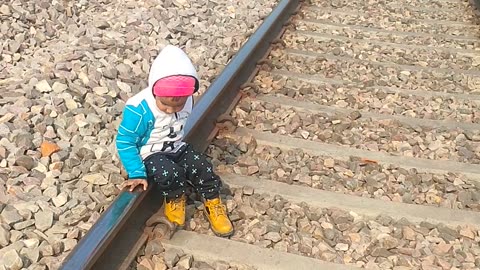 Cute little boy with train