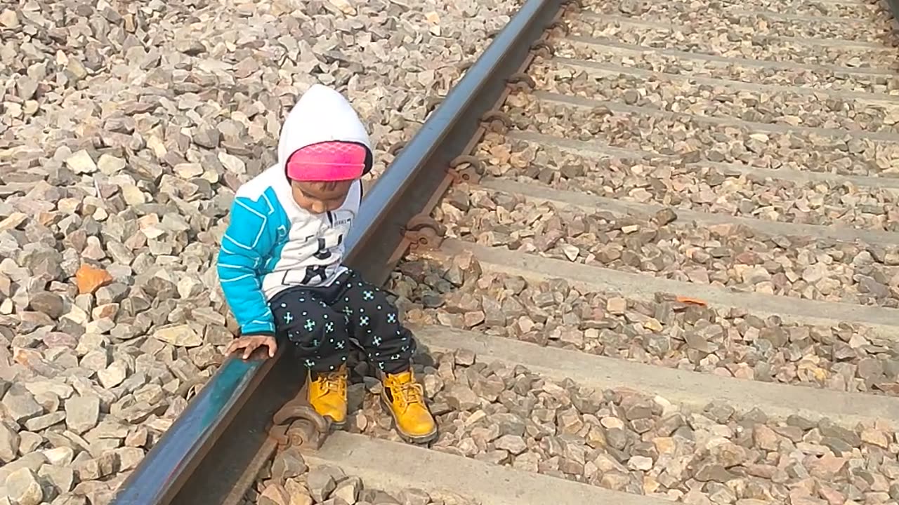 Cute little boy with train