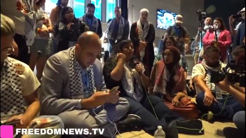 Uncommitted delegates cry and hug as they stage PROTEST sit-in outside of United Center on Night 3