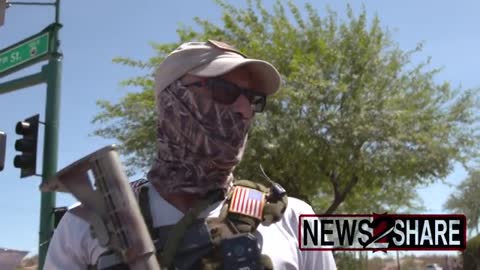 Today several armed Trump supporters gathered outside the FBI building in Phoenix, AZ