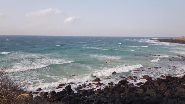 Watching the waves on Jeju Island in Korea