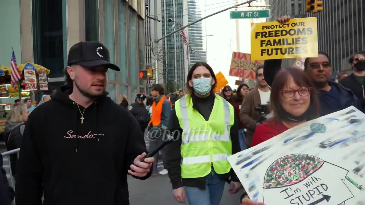 Anti-Trump Protestor calls Trump racist yet refuses to give me one example!