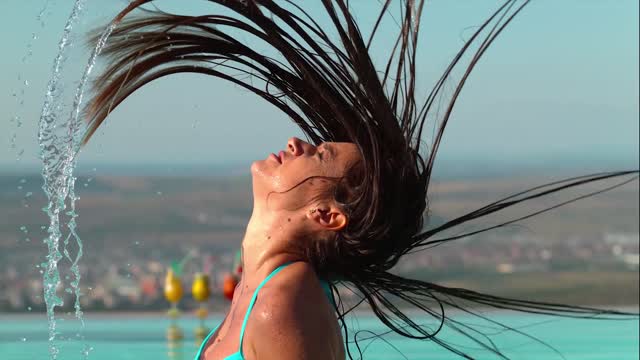 The allure of water with a girl's hair