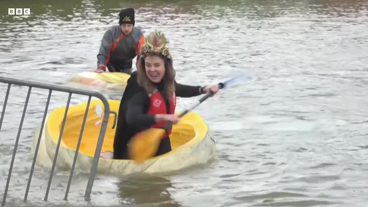 Belgians race boats made of giant pumpkins