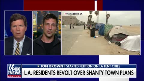 Tucker reacts to residents revolt over shanty town plans