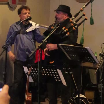 Band o Barley squeezing the Bag Pipe