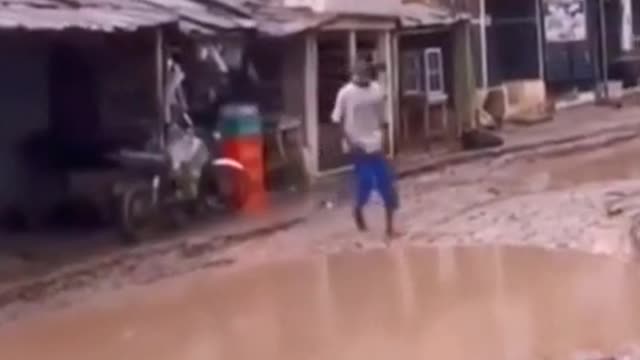 Very Intresting Guy walking in the water Hillarious!