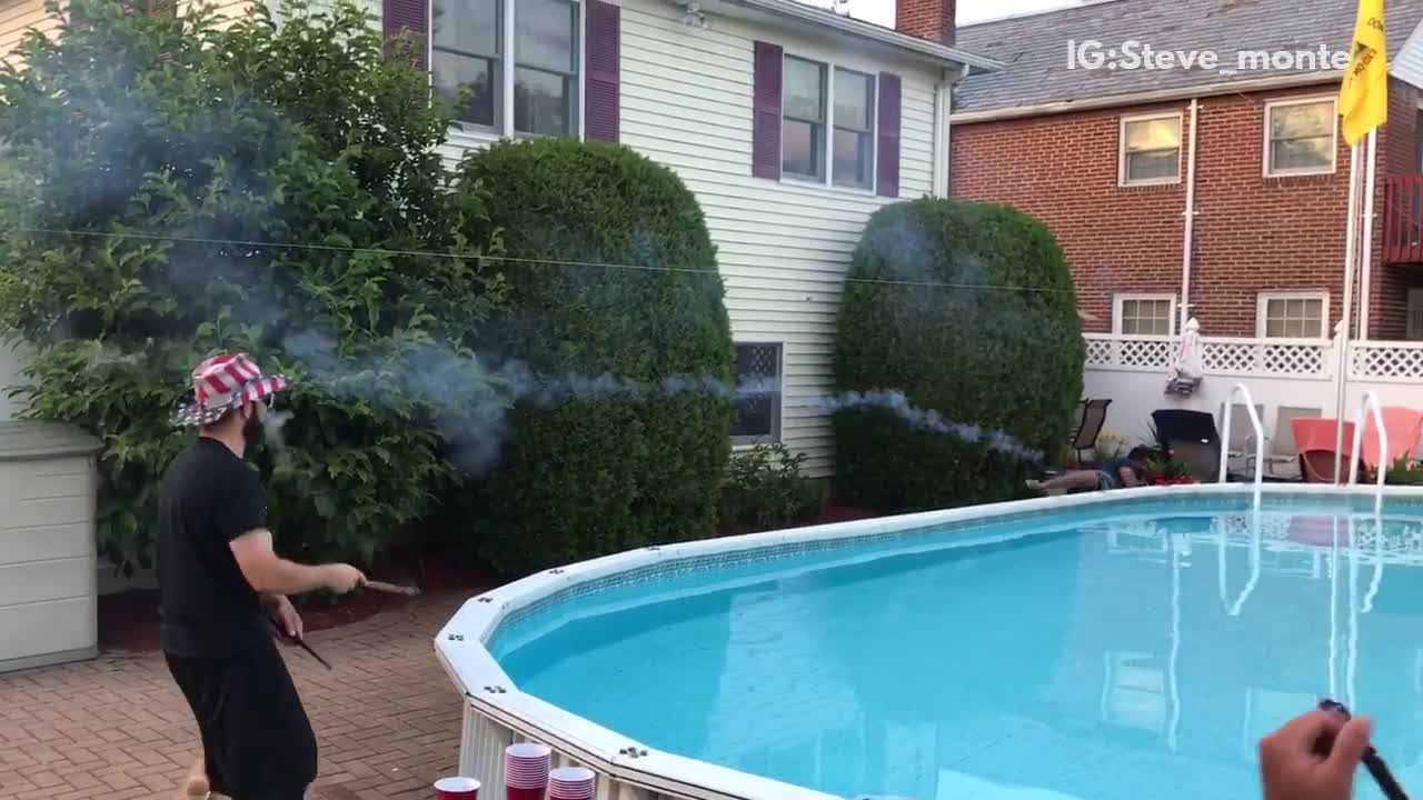 Roman candle fight by pool hits shoulder