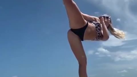 stretching girl in swimsuit