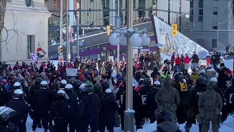 CANADIANS CHANT FREEDOM WHILE HOLDING THE LINE