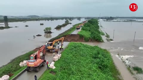 Drone footage shows collapsed river bank after heavy rain in South Korea