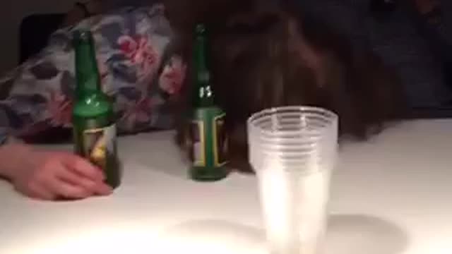 Guy black shirt hits head on table