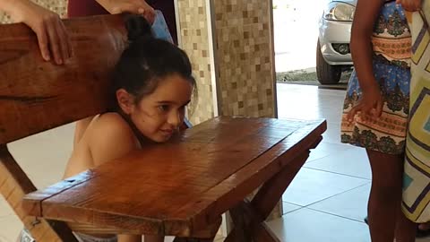 Little Girl Stuck in Chair Rescued by Family