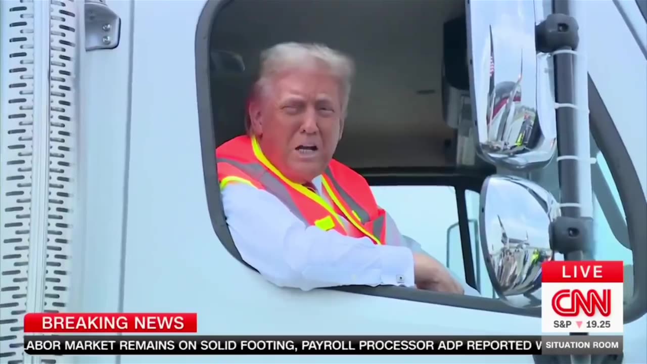 #Trump is driving around in a garbage truck.