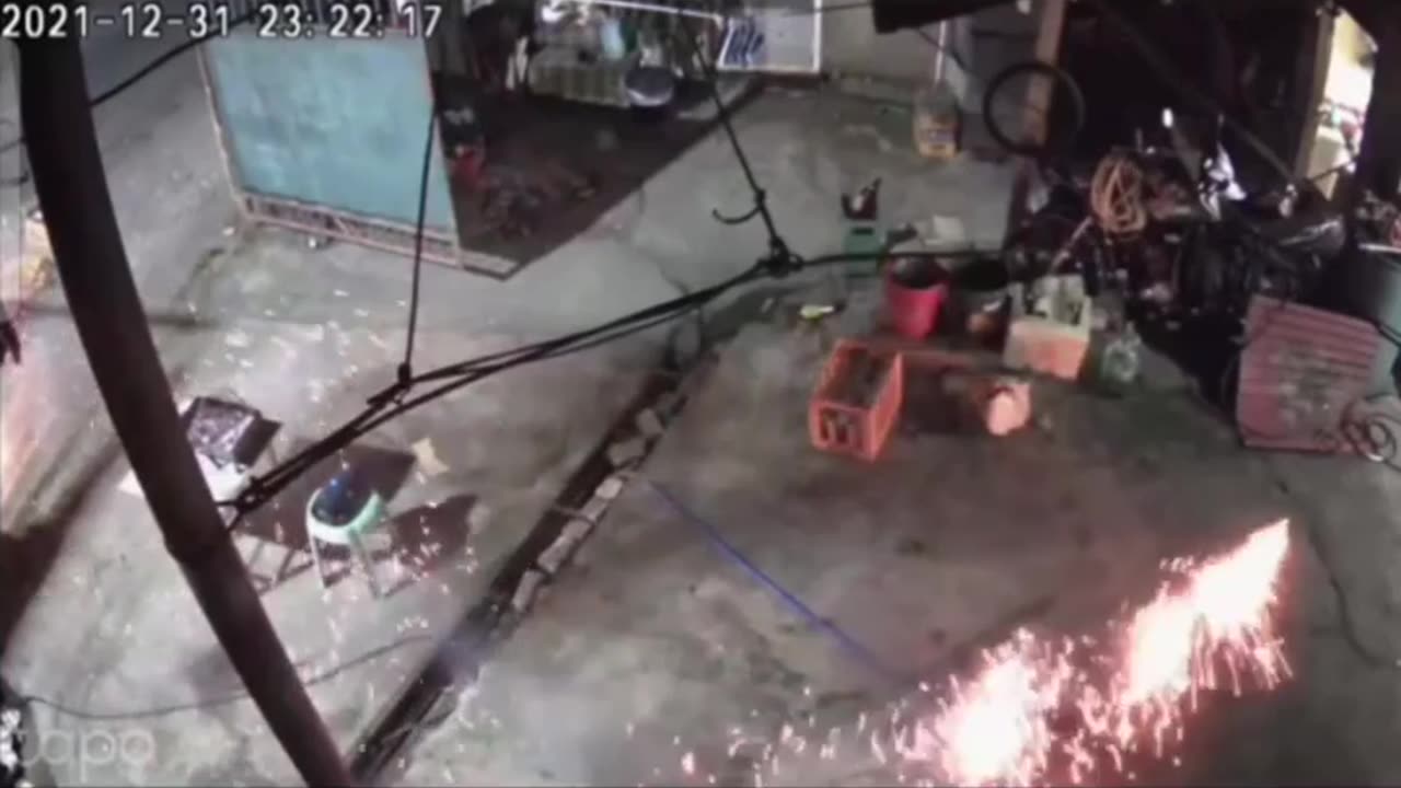 man lighting fireworks