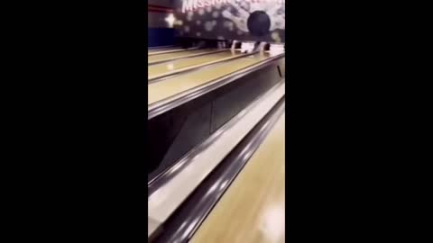 Man goes bowling, but the ball destorys the ground