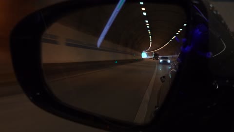 In a car passing through a tunnel 3