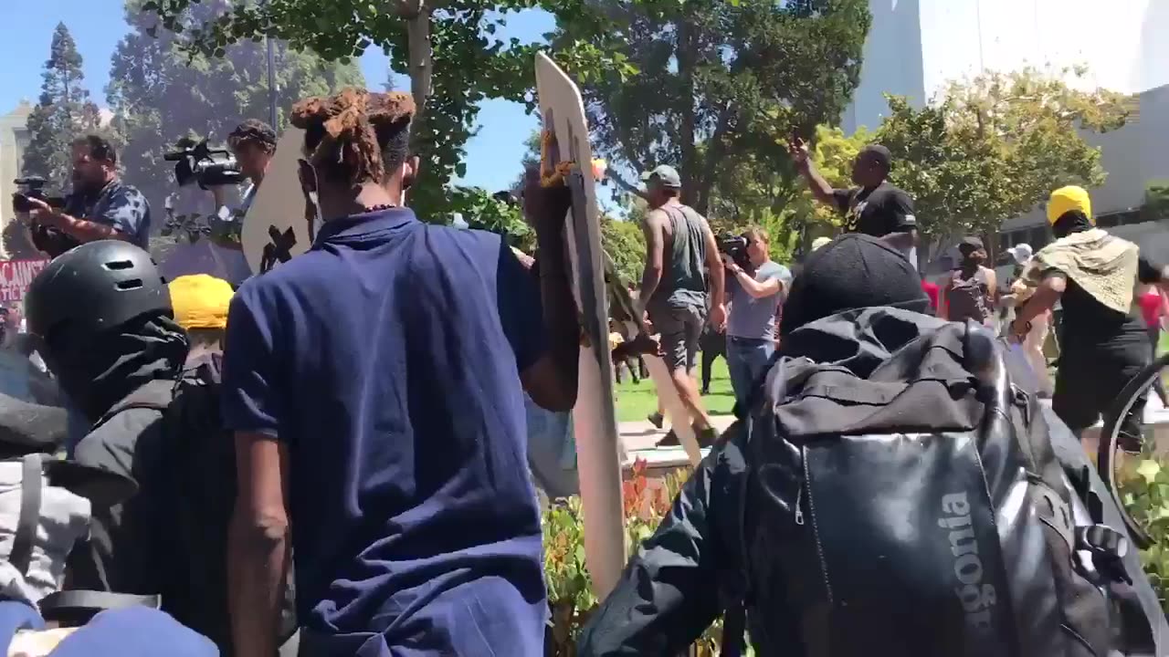 Aug 27 2017 Berkeley 1.1 Antifa chanting 'Whose park, OUR PARK' as they move forward into the park