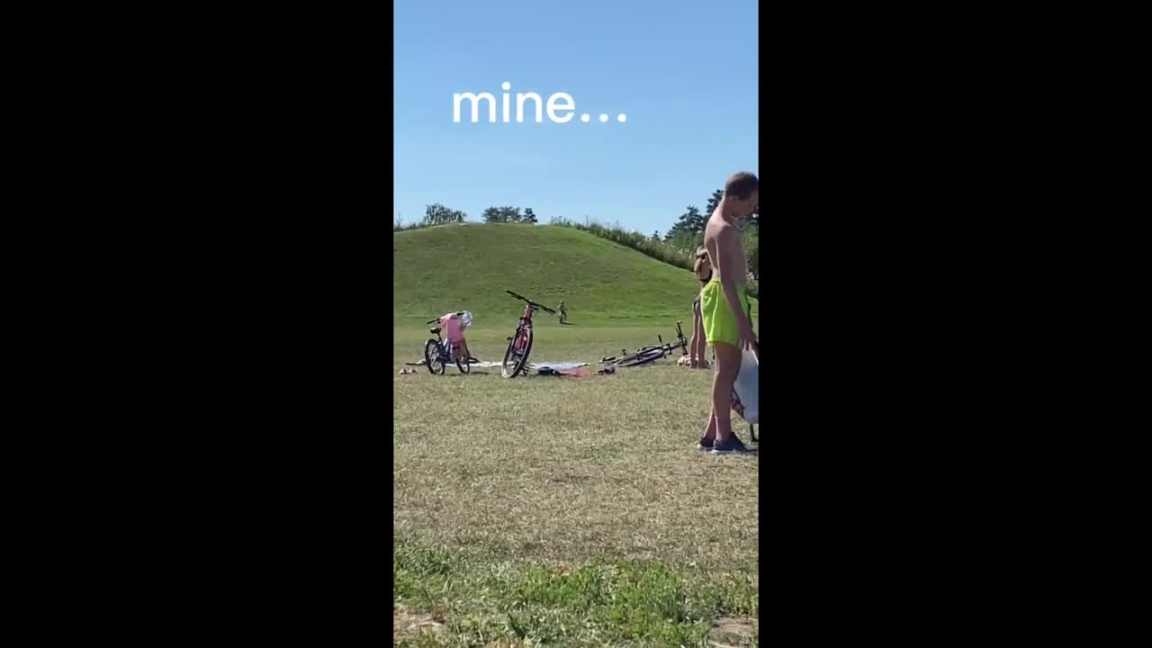 Fearless kid rides bike down hill, totally wipes Out