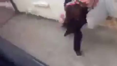 Backpack girl chases bus and falls on sidewalk