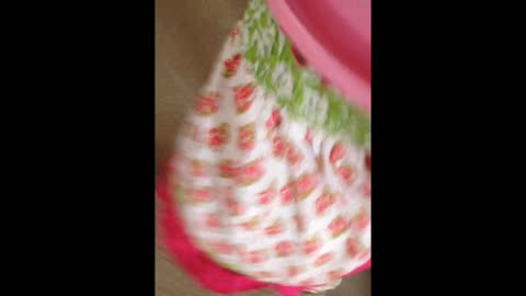 Bucket-head baby girl runs into wall