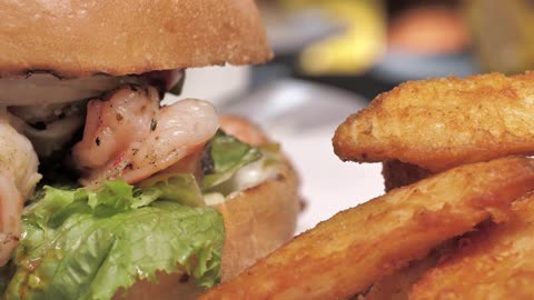 Shrimp burger with french fries