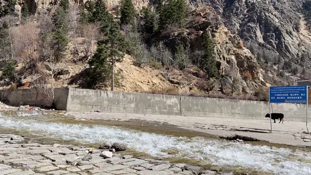 Drive across the river between the mountains