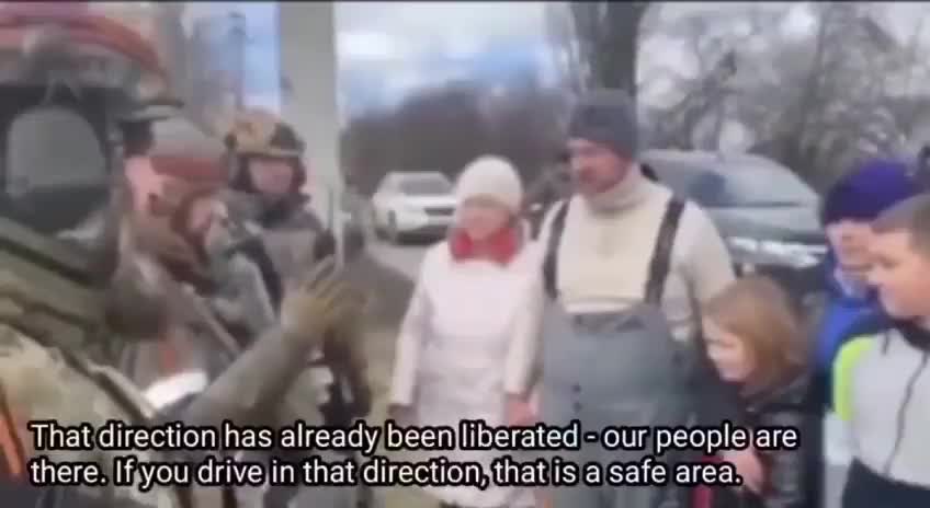 Russian soldiers helping Ukraine people