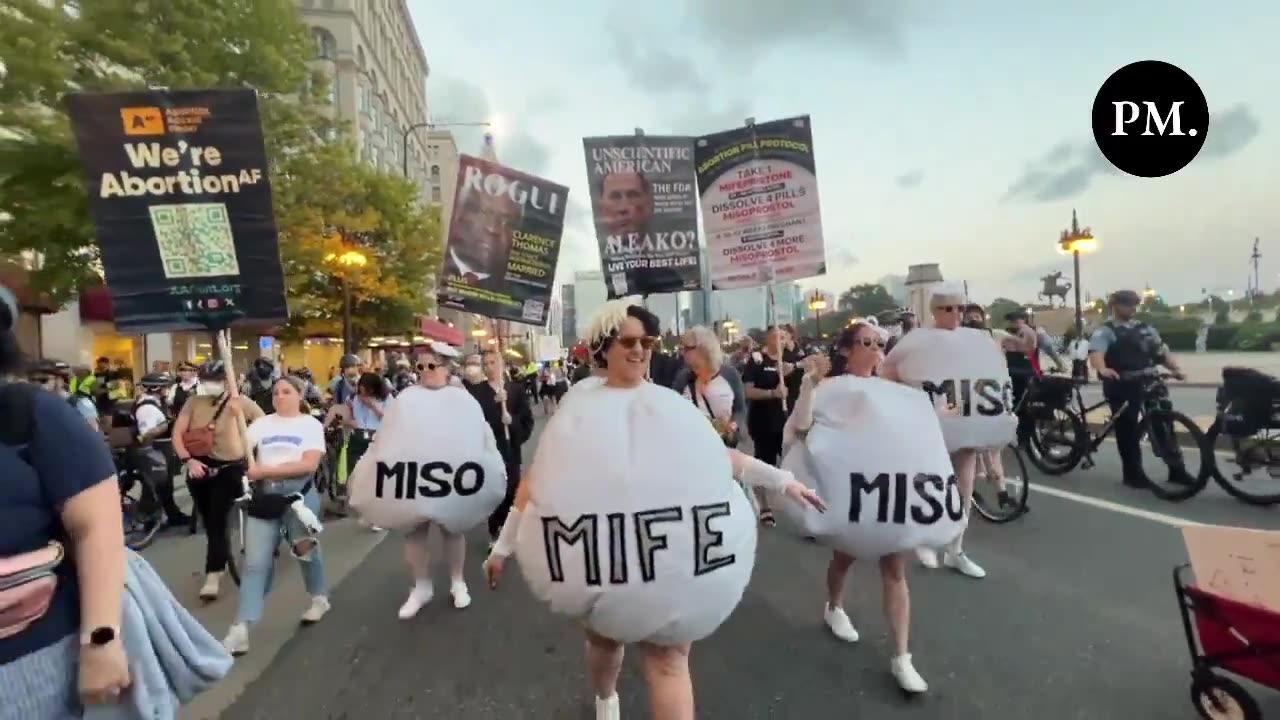 DNC Protesters March Through Chicago Streets Dressed as Abortion Pills