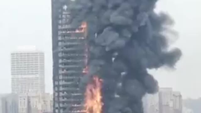 Massive Skyscraper Fire in China That Does Not Collapse Perfectly Onto It’s Footprint