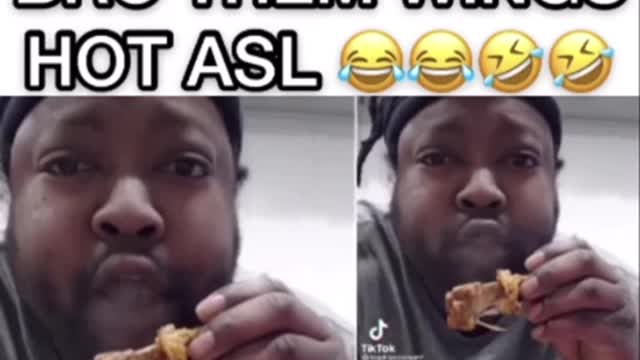 What eating steaming wings looks like 🤣🤣!