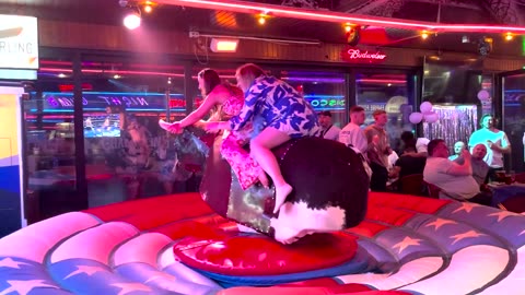 GIRL TAKE ON THE BULL! Benidorm Bull Ride. Mechanical Bull EPIC FAIL