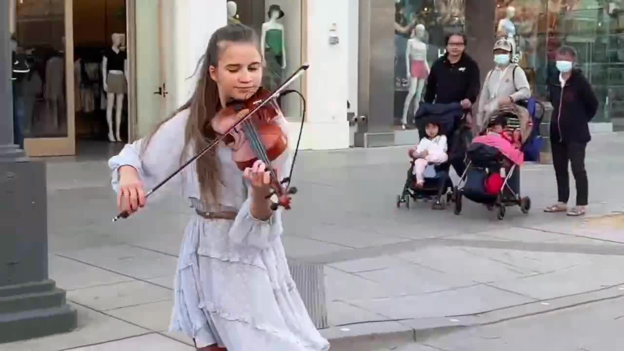 Does Anyone Know Who Is The Girl Eho Pulls The Violin?