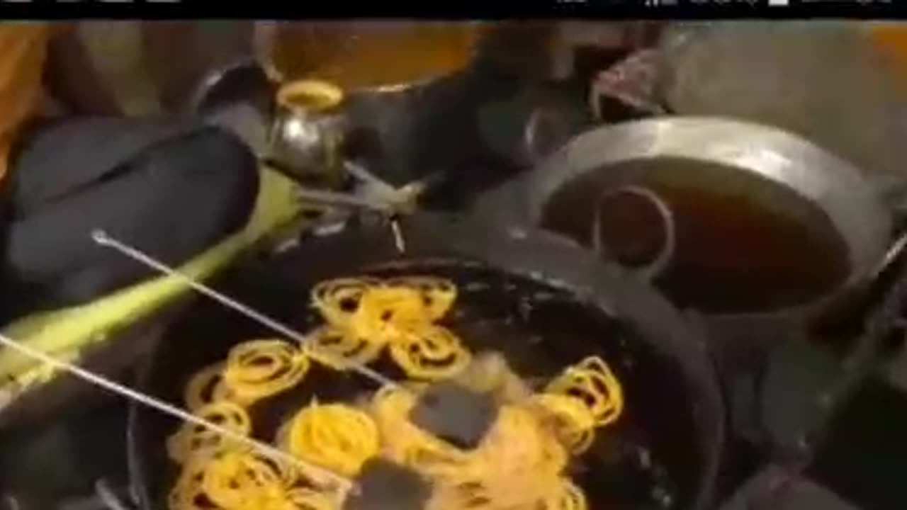 Very sweet Indian desert jalebi made with besan flour dipped in sugar syrup