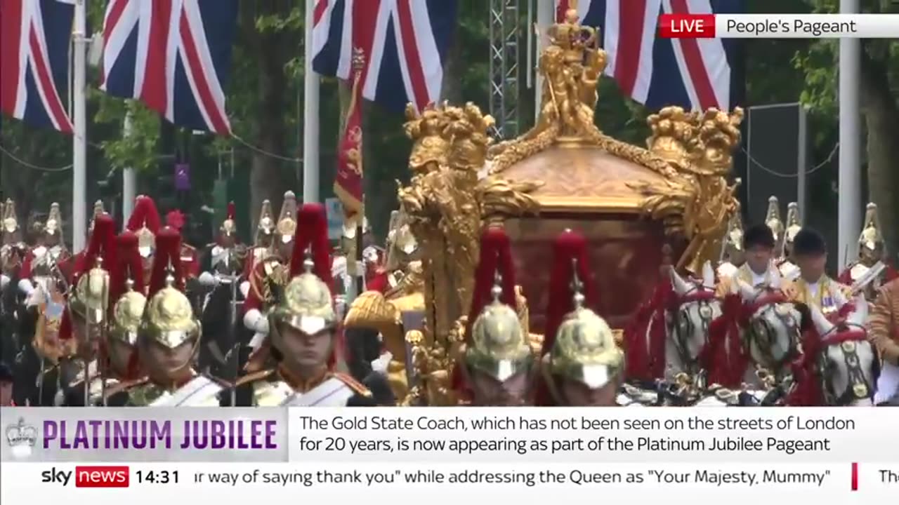 hologram of the queen drove through London - craziest thing is people wave to her