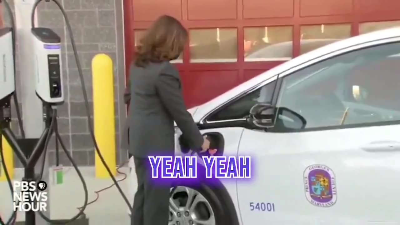 Electronic car chargers are a hard concept for Kamala, so she uses one like a