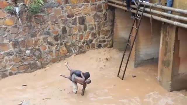 Watch this: Humanity still exist as a small boy is saved!!!!!