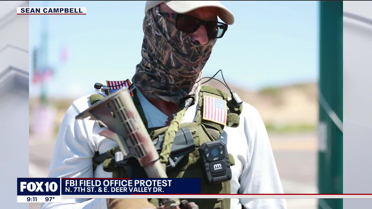 Armed Trump supporters protest outside of FBI office in Phoenix following Mar-a-Lago probe