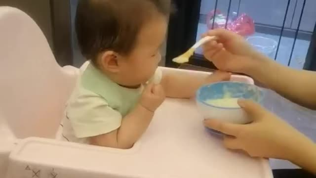 Delicious food that cute baby can't refuse
