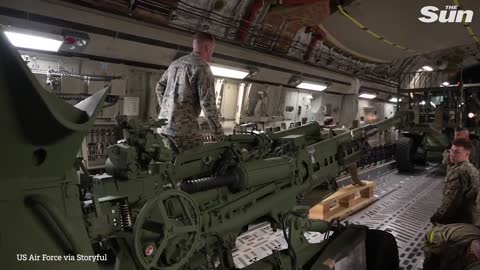 US Forces load Howitzers bound for Ukraine